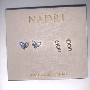 Golden Heart Earrings Set . Metal Brass . Set includes a CZ heart stud
